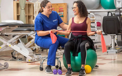 Physical Therapist working in healthcare setting