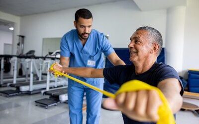 Physical Therapist Assistant working in healthcare setting